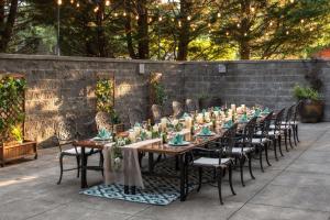 a long table with chairs and candles on it at DoubleTree Suites by Hilton Seattle Airport/Southcenter in Tukwila