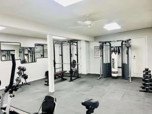 a gym with several treadmills and machines at Studio 6 Sierra Vista, AZ Fort Huachuca in Sierra Vista