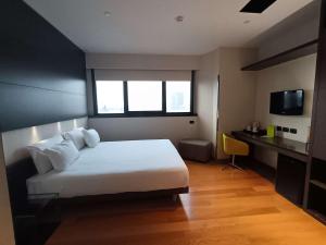 Voodi või voodid majutusasutuse Best Western Plus The Hub Hotel toas