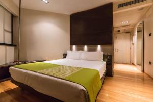 Voodi või voodid majutusasutuse Best Western Plus The Hub Hotel toas