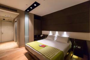 Voodi või voodid majutusasutuse Best Western Plus The Hub Hotel toas