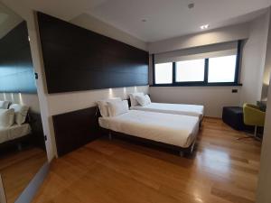 Voodi või voodid majutusasutuse Best Western Plus The Hub Hotel toas