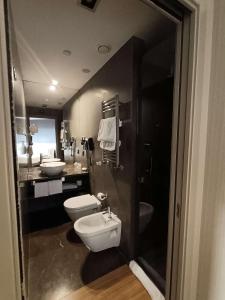 Vannituba majutusasutuses Best Western Plus The Hub Hotel