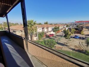 a view from a window of a street at Hostel Enea Homes in Santiago