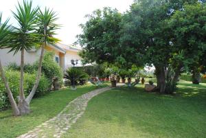 Um jardim no exterior de Le Case di Giulia