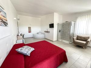 Postel nebo postele na pokoji v ubytování Valle degli Ulivi B&B + 37 fotografií