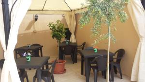 Restaurace v ubytování Affittacamere Il Terrazzo Di Archimede + 37 fotografií