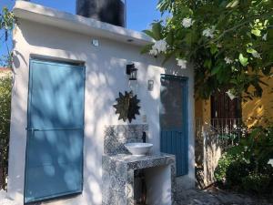 a bathroom with a sink on the side of a building at Casa Del Mirador in Yautepec