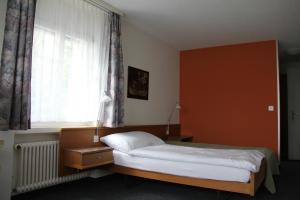 Postel nebo postele na pokoji v ubytování Hotel Linde