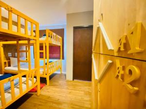 Postel nebo postele na pokoji v ubytování Frutta Hostel