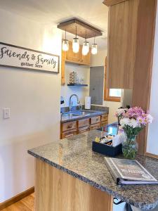 a kitchen with a granite counter top in a kitchen at A Relaxation Station in Nashville