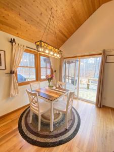 a dining room with a table and chairs at A Relaxation Station in Nashville