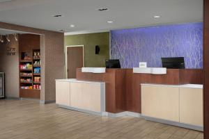 a lobby with a reception desk in a hospital at Fairfield Inn & Suites by Marriott Panama City Beach in Panama City Beach