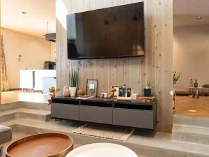A television and/or entertainment centre at West Shore Plus