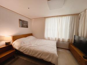 Postel nebo postele na pokoji v ubytování Easy access to Metro