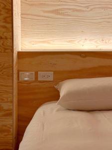 Postel nebo postele na pokoji v ubytování Mini West Hotel
