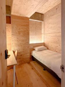 Postel nebo postele na pokoji v ubytování Mini West Hotel