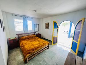 Postel nebo postele na pokoji v ubytování Las Hamacas (Hospedaje Rural)