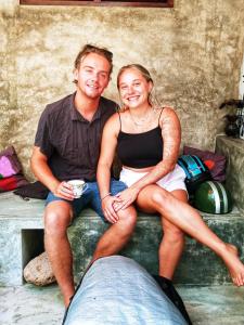 a man and a woman sitting on a bench at Venora Hiriketiya in Dickwella