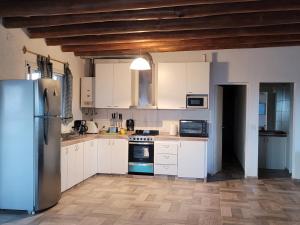 Kuchyň nebo kuchyňský kout v ubytování La casa de Diego. Mendoza