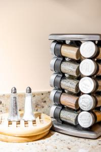 a pile of wine bottles sitting next to a wine rack at Ocean Villas at Turtle Bay in Kahuku