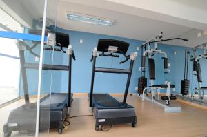 a gym with two bunk beds in a room at Crillon Palace Hotel in Londrina