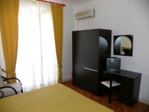 Postel nebo postele na pokoji v ubytování Hotel La Playa + 19 fotografií