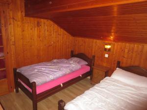 Letto o letti in una camera di Chalet Amanda