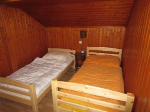 Postel nebo postele na pokoji v ubytování Chalet Amanda