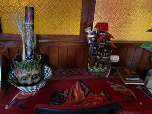 a living room with two vases on a table at Lovely apartment in the hearth of cusco in Cusco