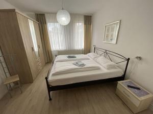 Giường trong phòng chung tại Holiday apartment on the Anger