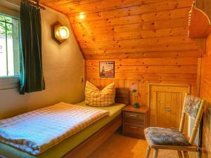 Кровать или кровати в номере Holiday home "Fuchsbau"