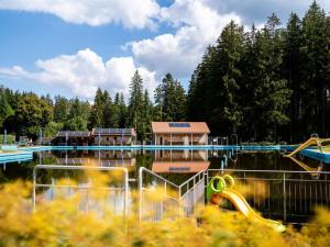 a water park with a playground and slides at Historical and modern in Schonach