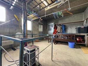 a room with a table with a cage in it at ロッヂ秀岳 in Chikuni +22 photos