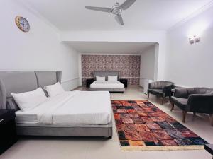 Katil atau katil-katil dalam bilik di Rhodium Hotel ONE