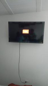 TV a/nebo společenská místnost v ubytování Habitación de Lujo para Pareja + 6 fotografií