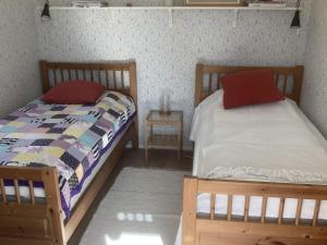 เตียงในห้องที่ Holiday home Kristinehamn VII