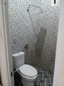 Un baño de Macan Kumbang Residence 7 fotos más
