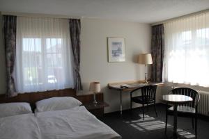 Postel nebo postele na pokoji v ubytování Hotel Linde