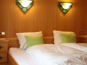 מיטה או מיטות בחדר ב-Holiday apartment Bergstille