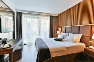 Postel nebo postele na pokoji v ubytování Hotel Fagus by Aycon