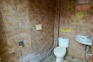 Koupelna v ubytování Java Capsule Hotel + 7 fotografií