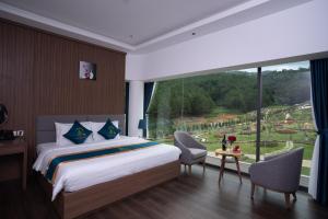 Postel nebo postele na pokoji v ubytování Rung Thong Nui Voi Villa & Resort