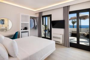 Televisyen dan/atau pusat hiburan di Palm Island Suites