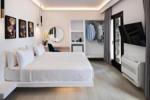 Katil atau katil-katil dalam bilik di Palm Island Suites