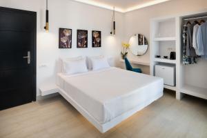 Katil atau katil-katil dalam bilik di Palm Island Suites