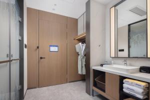 Kopalnica v nastanitvi Hampton by Hilton Dongguan Liaobu Songshan Lake Avenue
