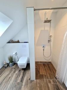 Ένα μπάνιο στο Ferienwohnung Fiete P.