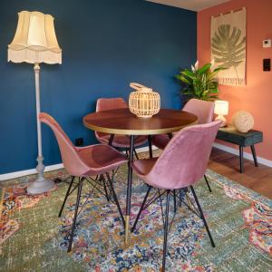 a dining room with a table and chairs at Lacuna VITA by Sonnevijver Residences in Lanaken