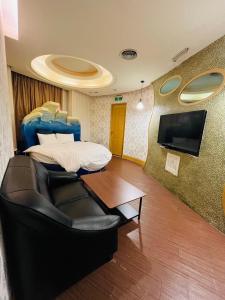 TV a/nebo společenská místnost v ubytování Walker Hotel - Chengde